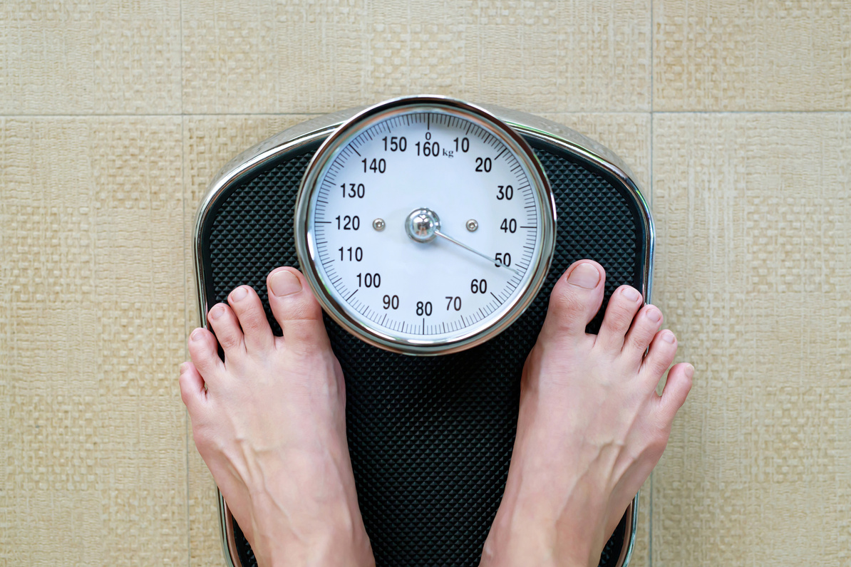 Person's Feet on Weighing Scale