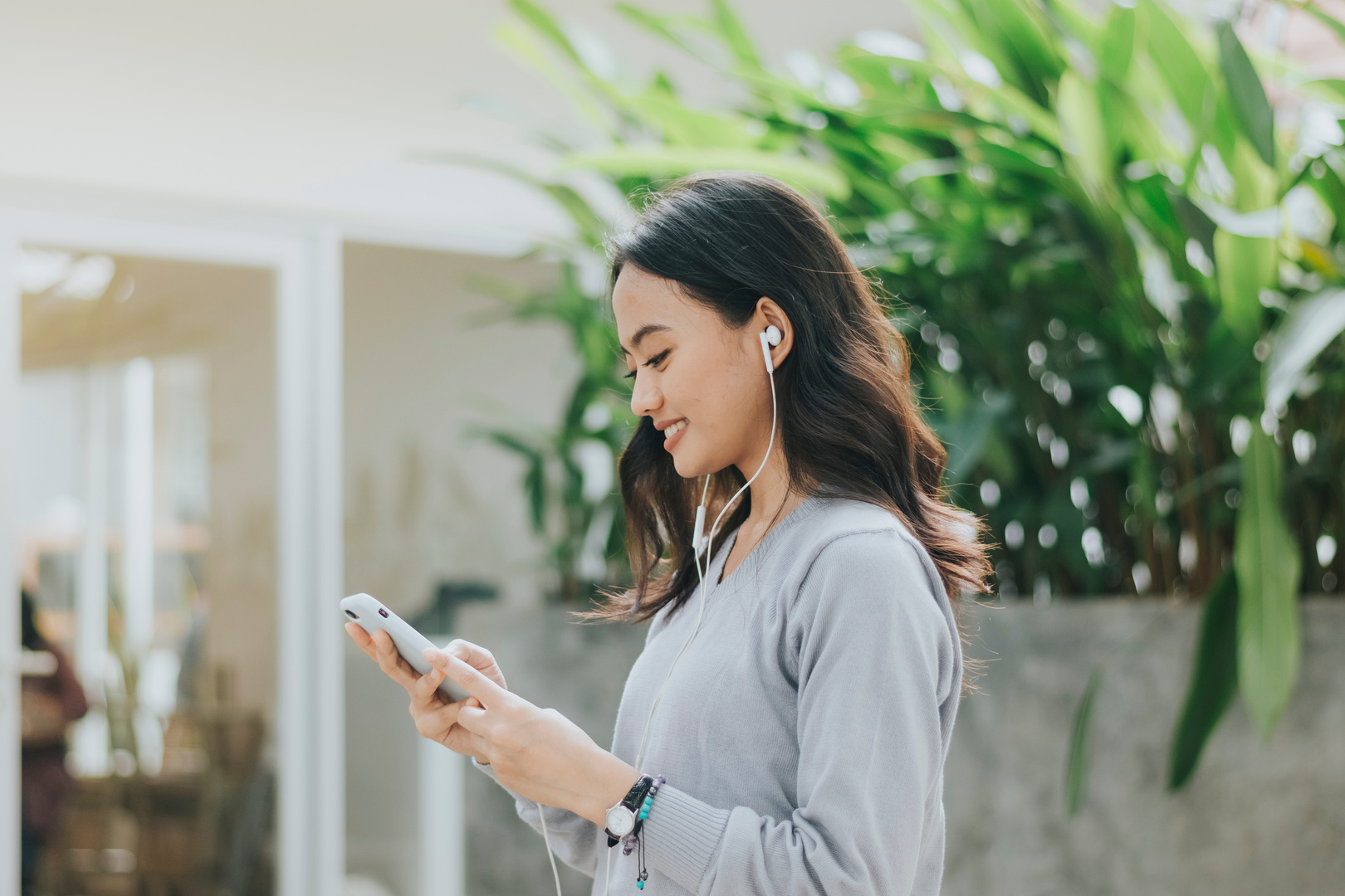 Woman Listening to Music on Her Headphones