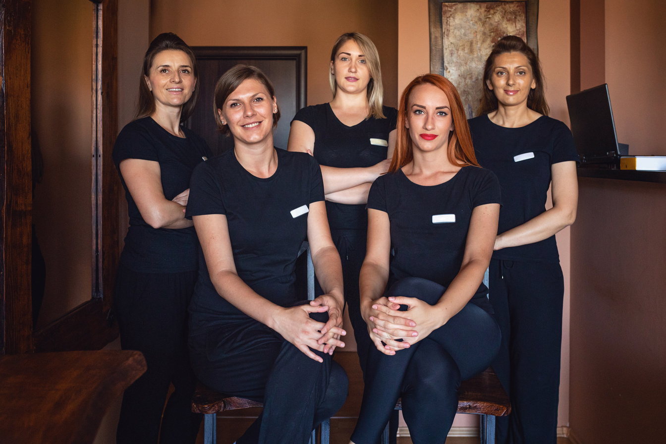 Group of beautiful massage therapists at a beauty spa